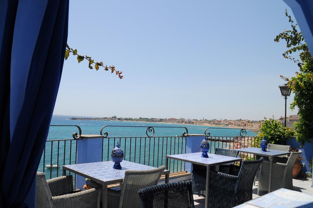Hotel Palladio จีอาร์ดีนี นักซอส ภายนอก รูปภาพ
